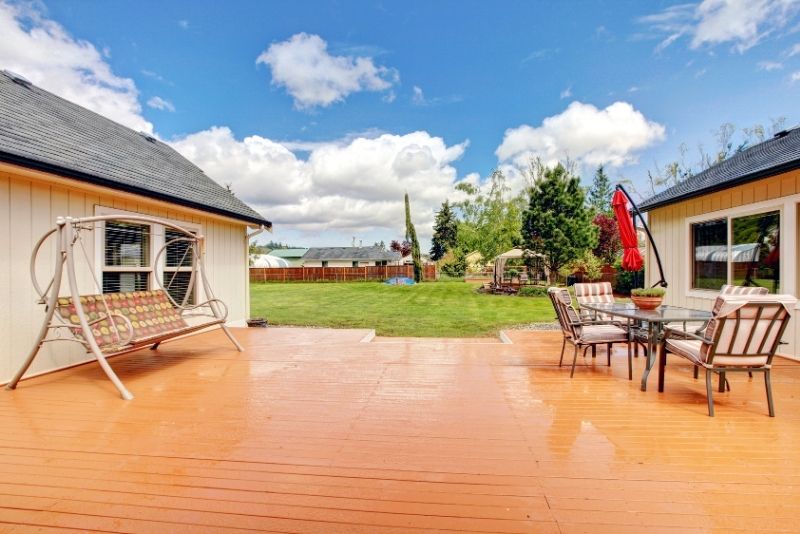 spacious decking area connecting the two houses